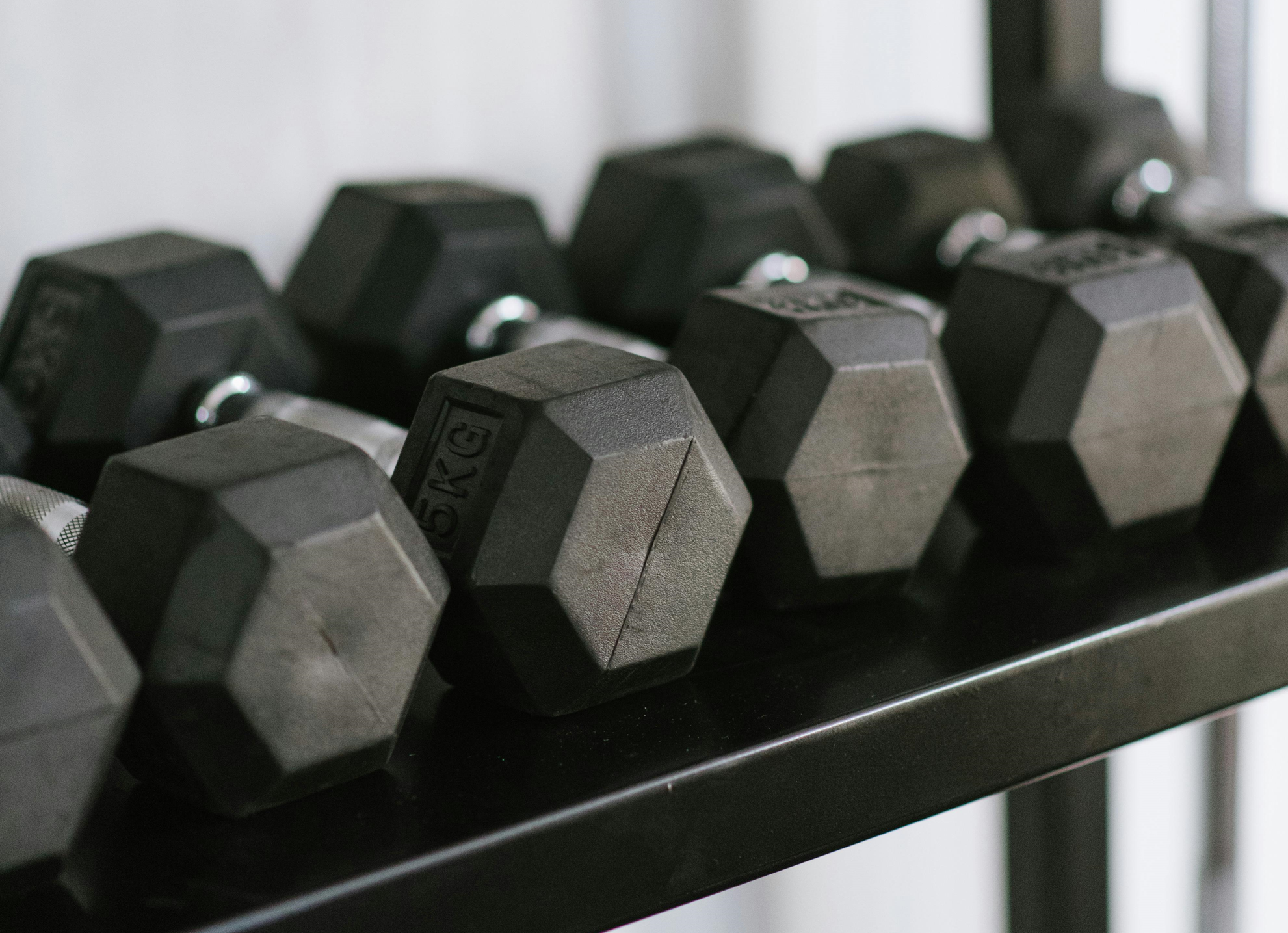 Rij met dumbells